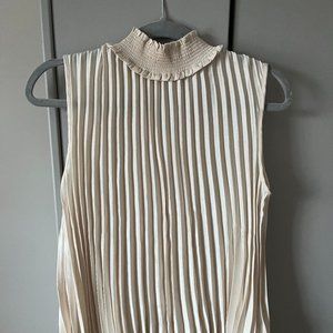 Gorgeous pleated cream top